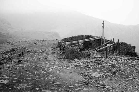 On the flank of the fell there are numerous abandoned slate quarries. / The Old Man of Coniston